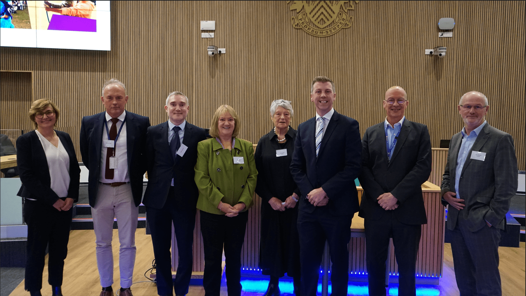 Matt and partners standing together at Shire Hall in November